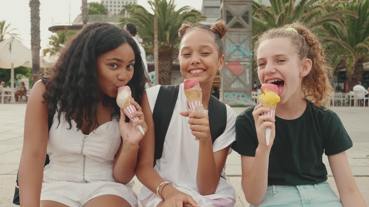 Girls Enjoying Ice Cream Together