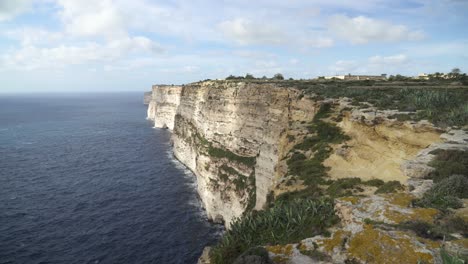 panoramic view of ta cenc cliffs near blue mediterranean sea