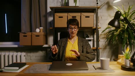 woman working late at home office