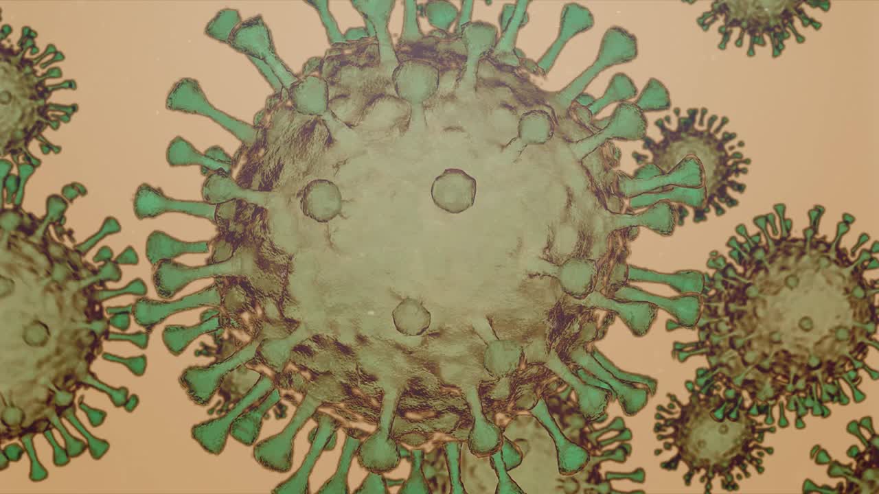 Coronavirus: microrganismo di colore verde che si diffonde su sfondo marrone chiaro - Primo piano