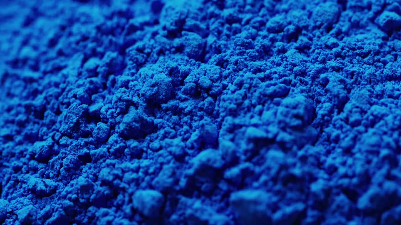 복사 공간과 함께 파란 가루의 클로즈업 비디오