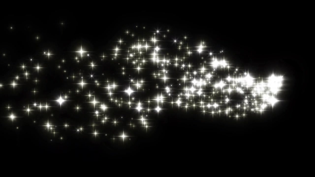 Animated Glowing Star Particles Moving Across Black Background