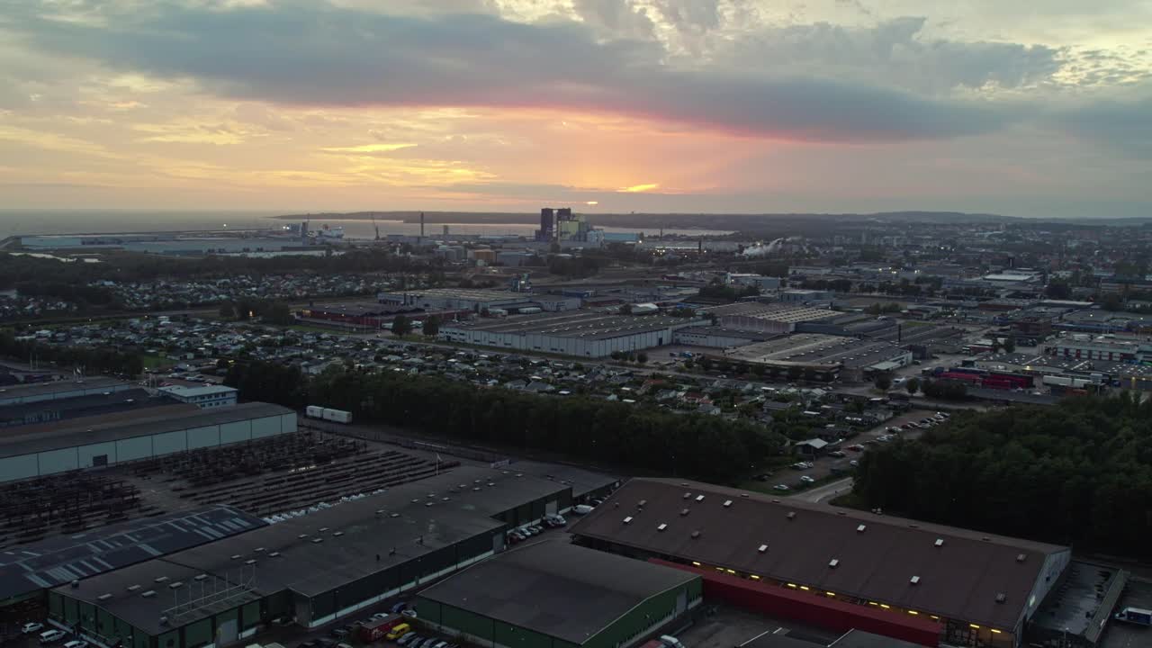 Sunset over Halmstad's industrial area, serene and expansive view