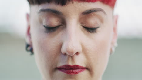 close-up portrait of a woman with colorful hair