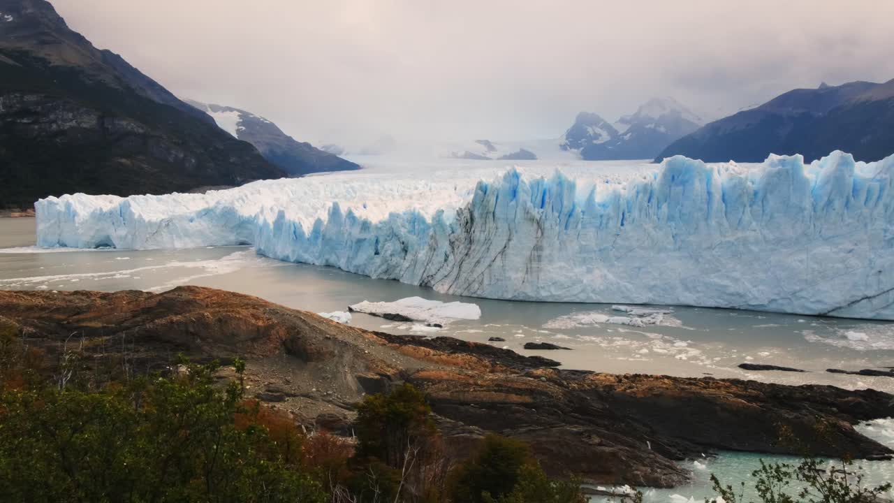 Natural View, Perito Moreno Glacier Ice Rock Formation, Patagonian Landscape of Glaciares National Park in Warm Summer, Green Vegetation