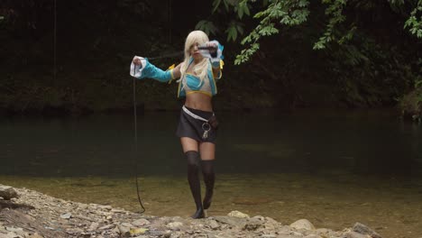 anime cosplayer shows her whip at an amazing nature location on the caribbean island of trinidad