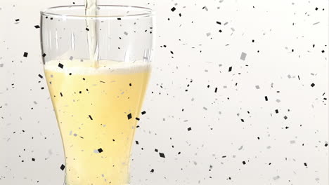 animation of confetti falling over champagne glass on white background