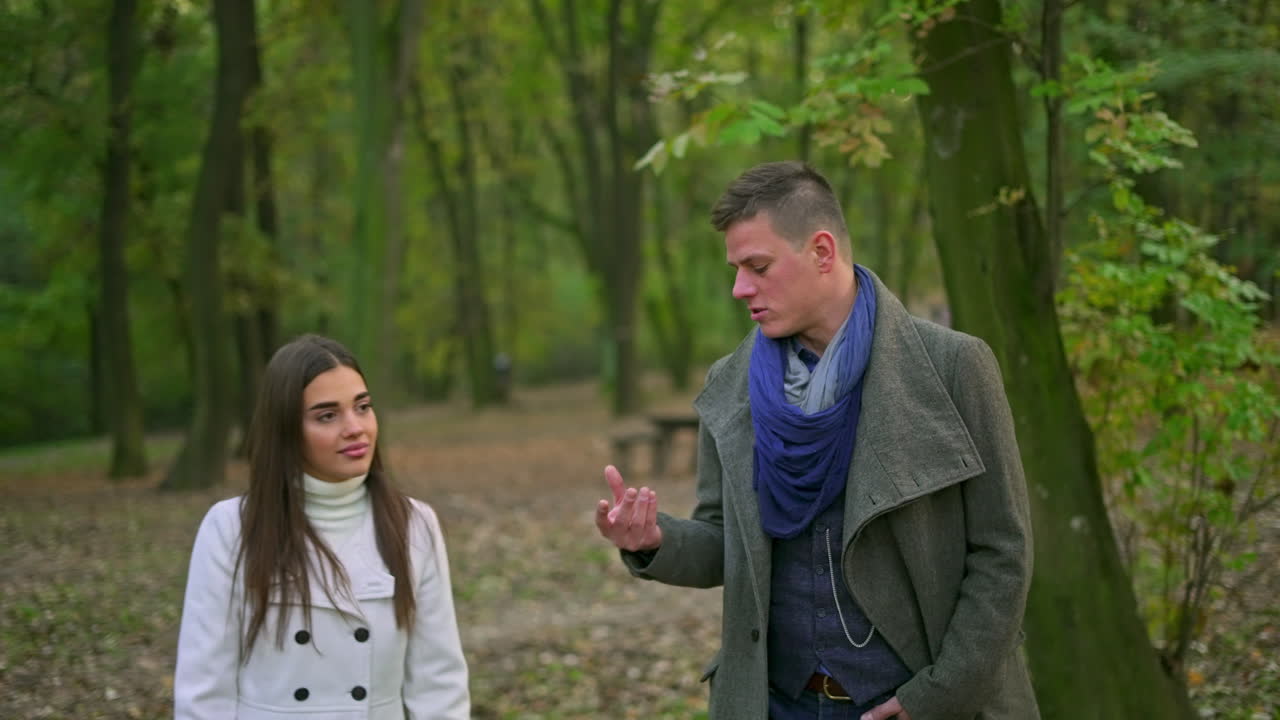Couple in the park during autumn