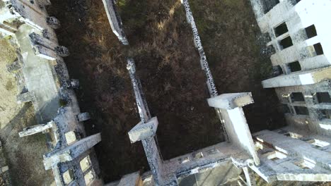 natural disaster destroyed and abandoned building ruins, aerial top view