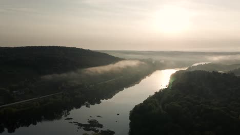 misty river and landscape of windsor quebec canada during a cold morning -aerial