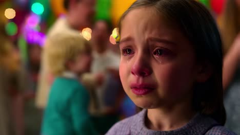 crying girl at a party