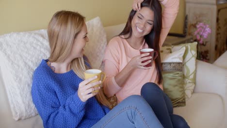 two happy vivacious young women