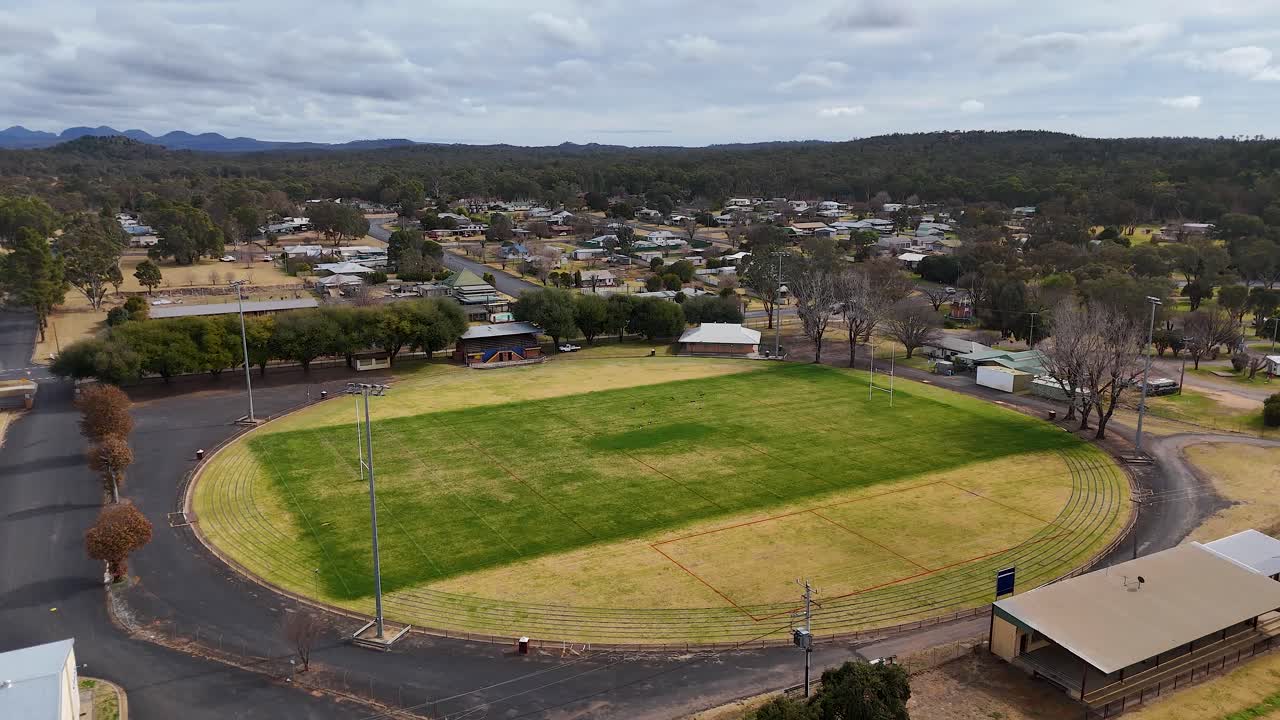 Empty football oval in a quiet residential neighborhood