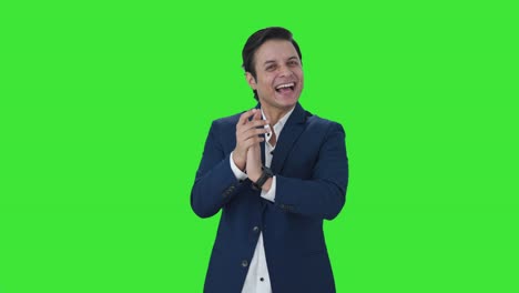 Happy-Indian-businessman-clapping-and-appreciating-Green-screen