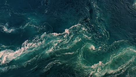 waves of water of the river and the sea meet each other during high tide and low tide.