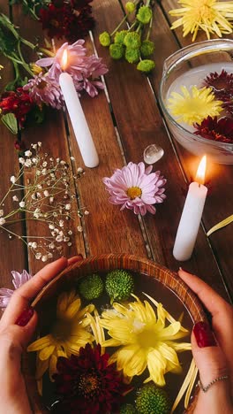 spiritual altar with flowers, candles, and crystals