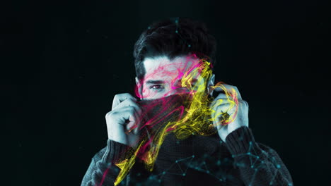 Man adjusting scarf with colorful abstract animation overlay on dark background
