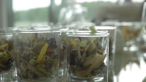 assorted salad in small glasses for a buffet