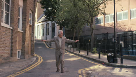 Contemporary-funky-elderly-man-street-dancer-dancing-freestyle-in-the-city