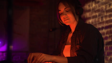 woman djing at the disco