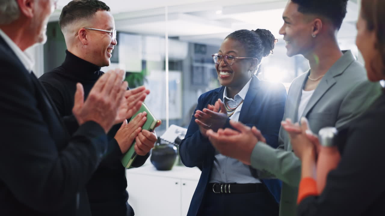 Business Team Celebrating Success with Applause