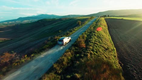 Driving-On-The-Road-During-Sunset-Near-Rural-Landscape-Of-Pienza-In-Tuscany-Italy