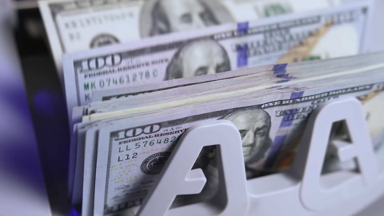 Finance business money counting. Cropped view of the bank cash counter machine. Money concept