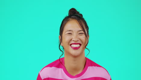 Asian-woman,-laughing-and-face-portrait-for-funny