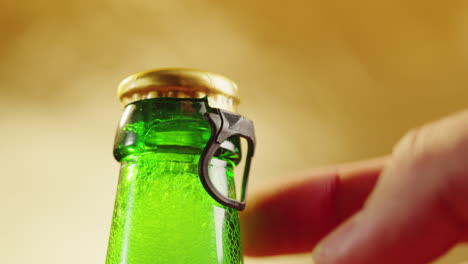 Close-up of a beer bottle with foam