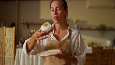 young woman enjoying a delicious cake