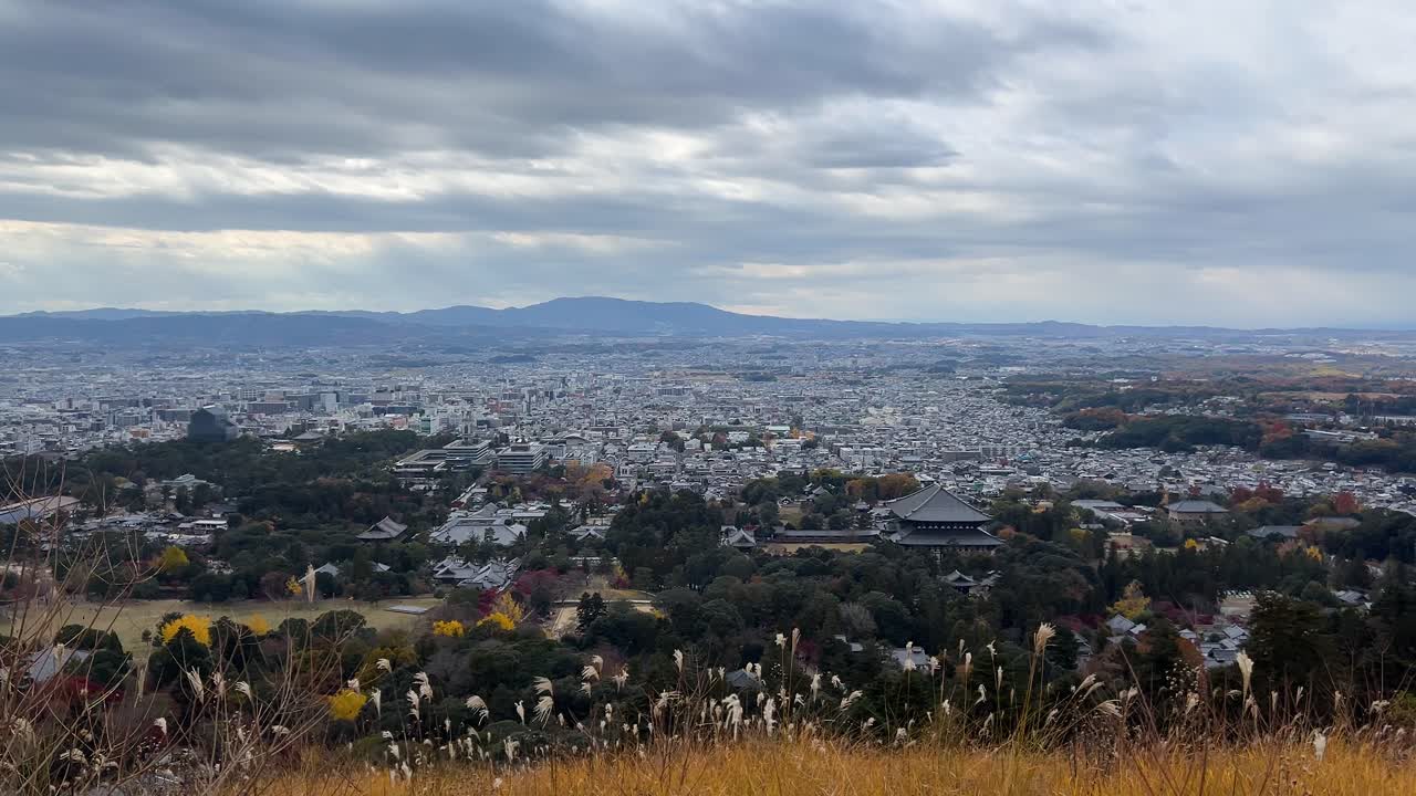 Cloudy panorama view over Nara City during fall colors