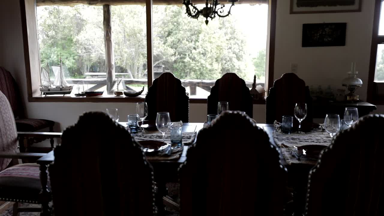 Evil society grand dining table serving at resort