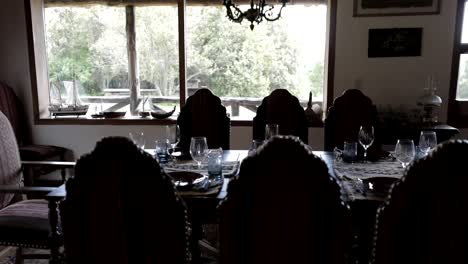 evil society grand dining table serving at resort