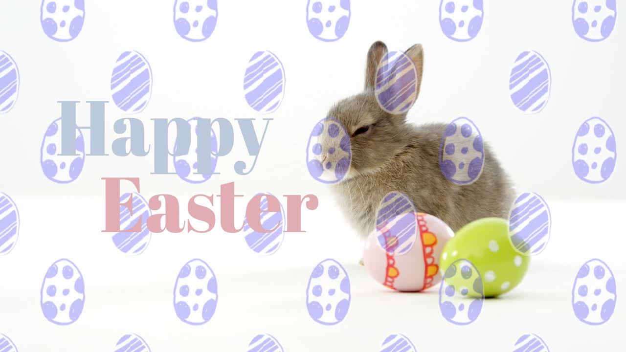 Animazione di uova di Pasqua con coniglio e testo 'Buona Pasqua'