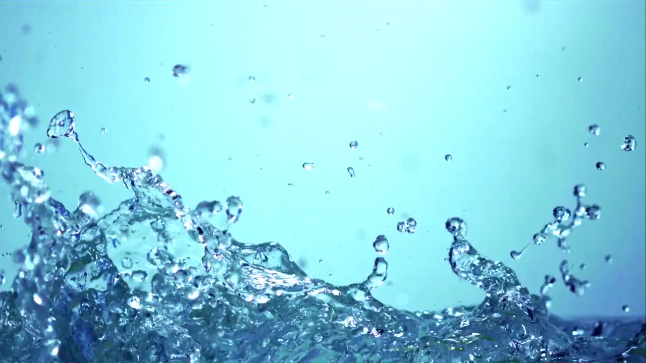 Dynamic Slow Motion Splash of Clear Water with Droplets
