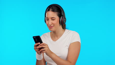 Phone,-music-and-dance-with-a-woman-on-a-blue