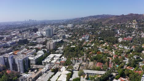 High-aerial-panning-shot-of-Downtown-Hollywood-towards-West-Hollywood-and-Century-City-in-Los-Angeles,-California