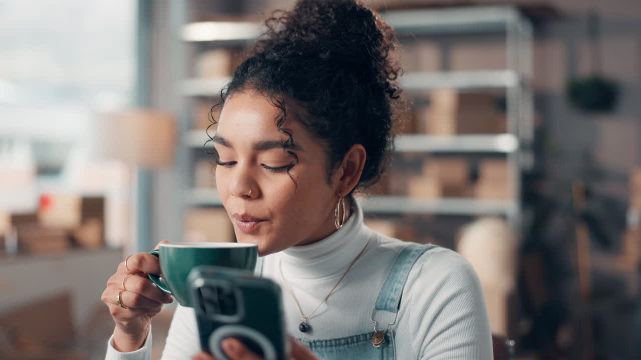 Woman Enjoying Coffee and Using Phone