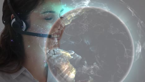 animation of globe and connections over businesswoman wearing phone headsets