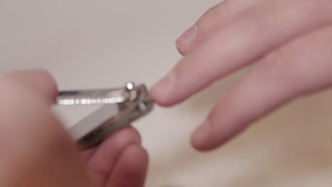 Close-up-shot-trimming-finger-nails