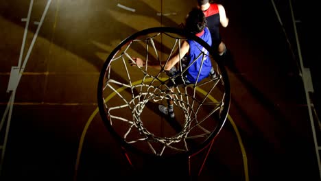 competitors playing basketball in the court 4k