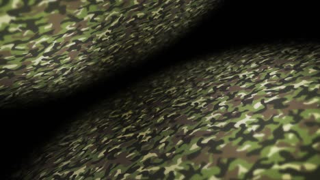 green camouflage pattern background. military uniform concept. abstract line and wave texture. loop animation.