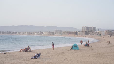 people walk on venice beach of los angeles ,usa