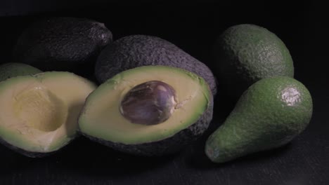 Avocadoes-on-black-background