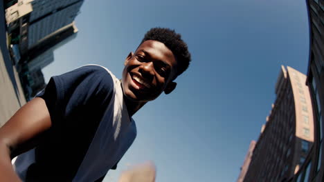 smiling young man in the city
