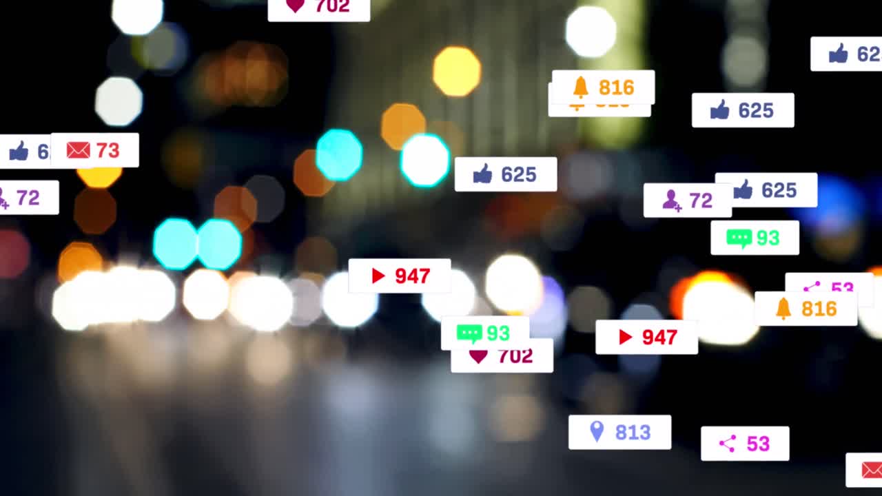 소셜 미디어 아이콘과 숫자의 애니메이션 초점이 맞지 않는 도시 불빛