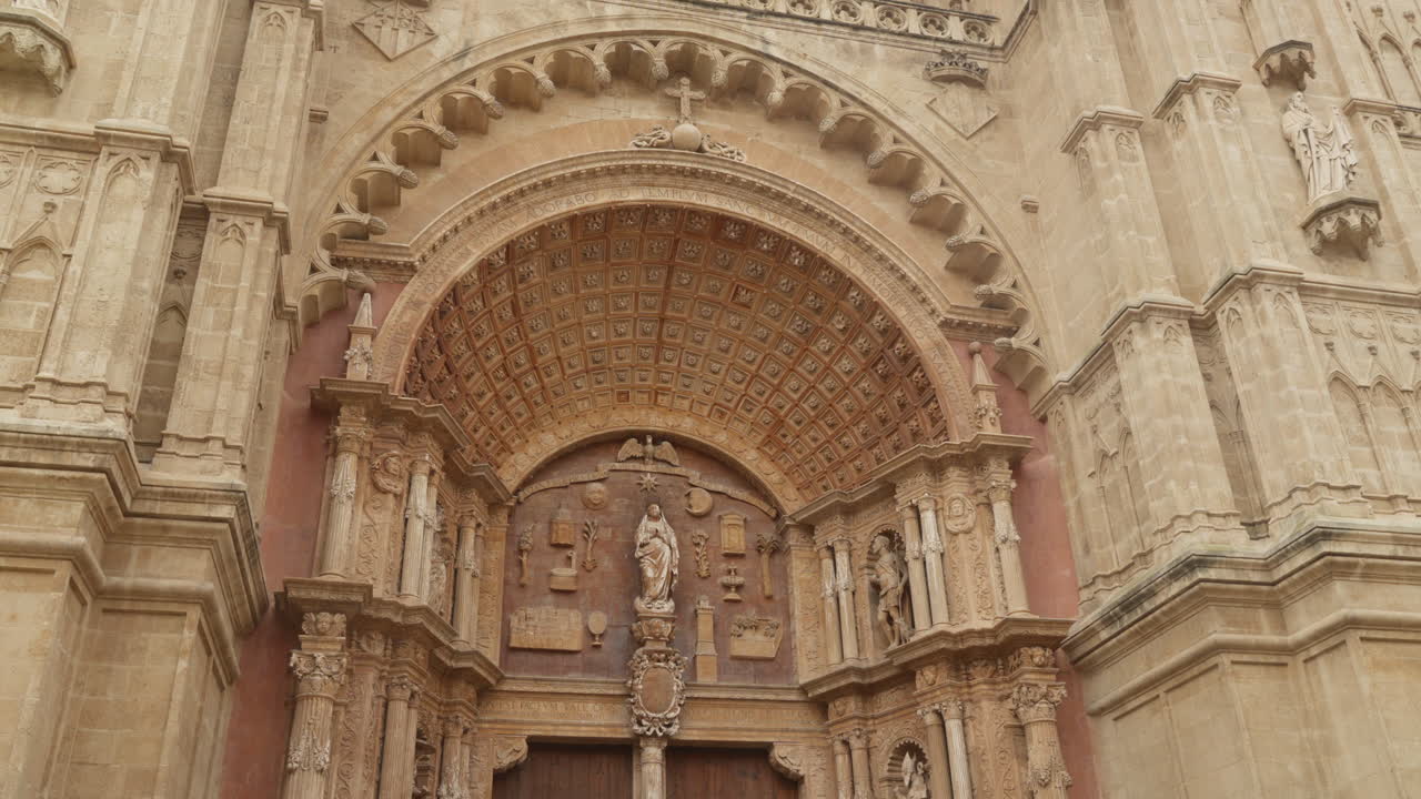 Ornate entrance of historic Palma Cathedral in Mallorca. Ideal for travel documentaries or historical projects.