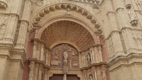 ornate entrance of historic palma cathedral in mallorca. ideal for travel documentaries or historical projects.