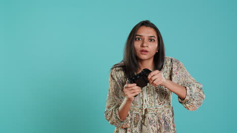 Competitive-woman-playing-videogames-with-motion-controlled-controller