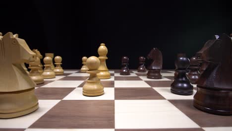 Cinematic-chess-moves-on-a-wooden-chessboard